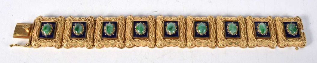 A 14 Carat Gold Panel Bracelet set with Jade Cabochons. Stamped 14K, 16.5 cm x 2.1cm, weight 60.4g