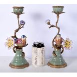 A pair of Porcelain and ormolu mounted candle sticks 30cm