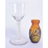 A LARGE ANTIQUE AIR TWIST GLASS together with a smaller cameo glass vase. Largest 20 cm high. (2)