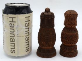 Two 19th Century Carved Coquilla nut pepper shakers 11cm (2).