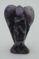 A CARVED AMETHYST STONE ANGEL. 95 grams. 7.5 cm x 4.25cm.