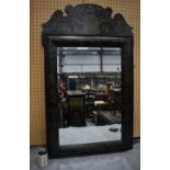 A large Chinoiserie bevelled mirror 116 x 72 cm
