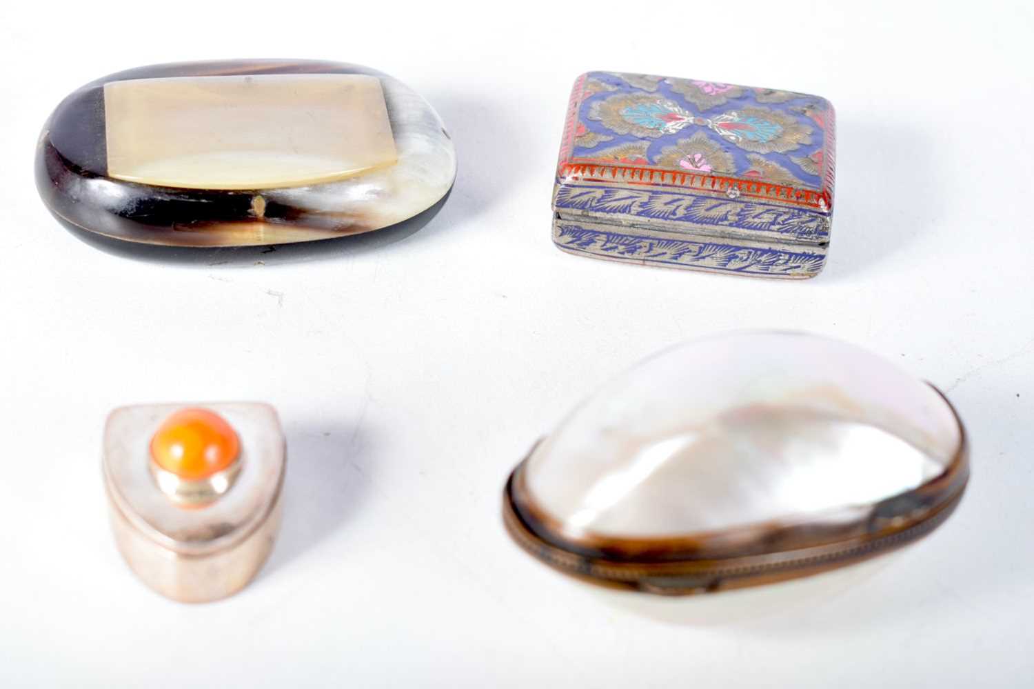 Four Snuff / Pill Boxes of varying designs. Largest 6.3 cm x 1.8 cm x 1.8 cm (4)