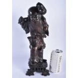 AN 18TH/19TH CENTURY CHINESE CARVED ROOTWOOD FIGURE OF AN IMMORTAL Qing. 33 cm high.