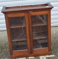 A mahogany glass fronted hanging bookcase 81 x 75 x 25cm.