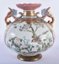 A 19TH CENTURY JAPANESE MEIJI PERIOD TWIN HANDLED KUTANI PORCELAIN VASE painted with scholars and