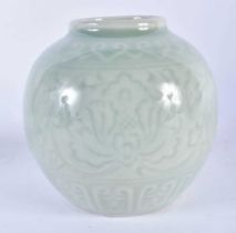 AN EARLY 20TH CENTURY CHINESE CELADON PORCELAIN JARLET Late Qing/Republic. 10 cm x 8 cm.