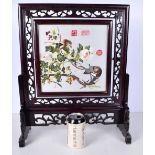 A Chinese silk embroidery held in a Chinese hardwood frame 49 x 42 cm ..