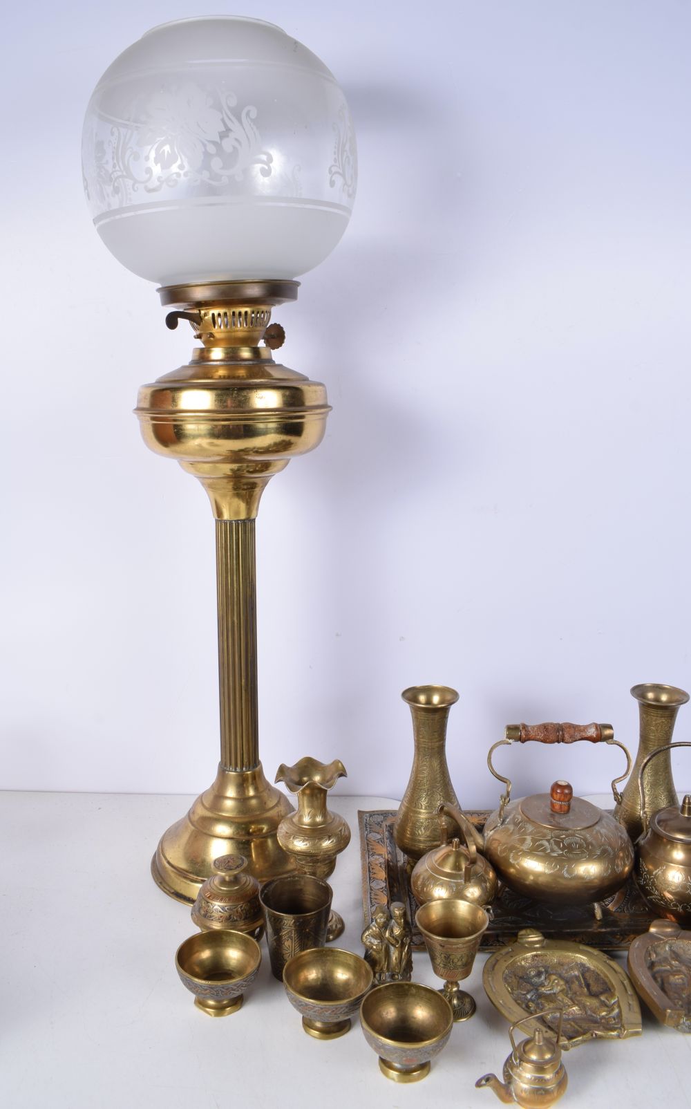 A collection of Central Asian brass items , together with a brass oil lamp with an etched glass - Image 6 of 8