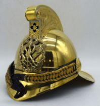 A contemporary brass Firemans helmet 26 x 35 cm.