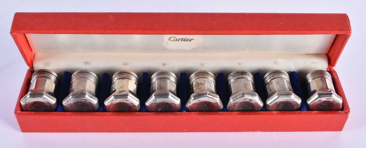 EIGHT CARTIER SILVER CONDIMENTS. 66 grams. 3.5 cm x 2.5 cm. (8)