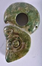 A CHINESE CARVED ARCHAIC JADE AMULET possibly early. 117 grams. 8 cm x 5 cm.