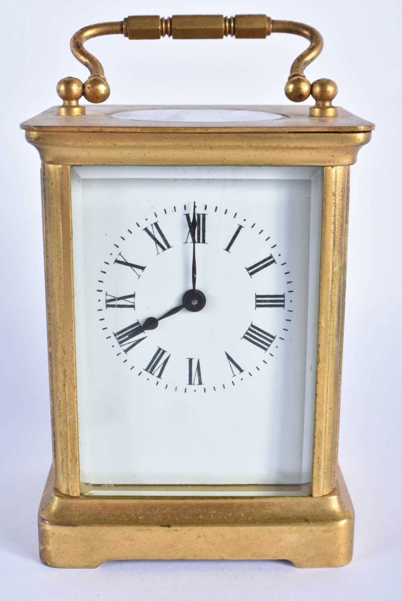 A FRENCH BRASS CARRIAGE CLOCK. 13.5 cm high inc handle.