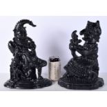A pair of cast iron Punch and Judy doorstops 32 cm.