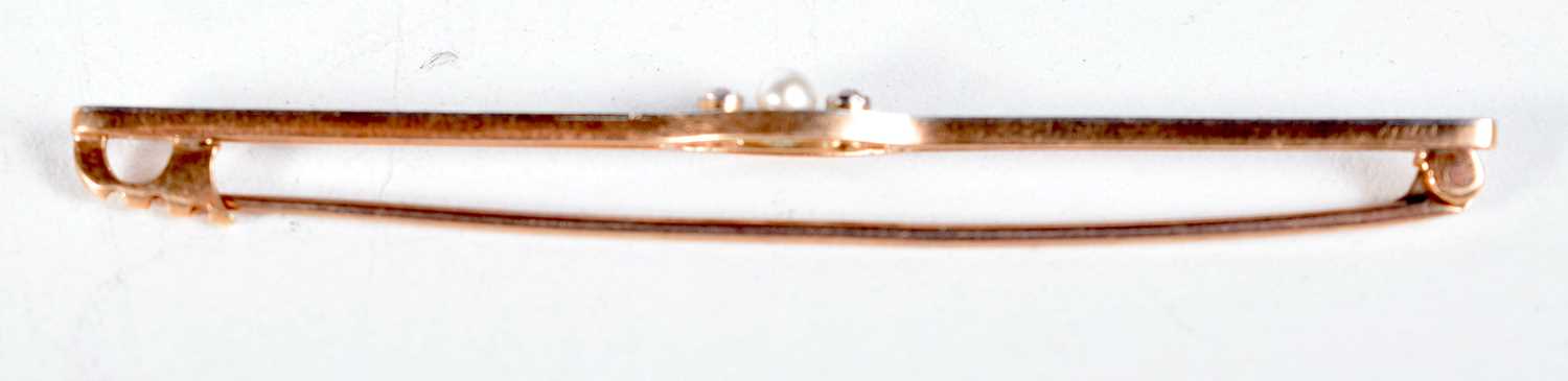 AN EDWARDIAN 15CT GOLD DIAMOND AND PEARL PIN. 3.3 grams. 7 cm wide. - Image 3 of 3