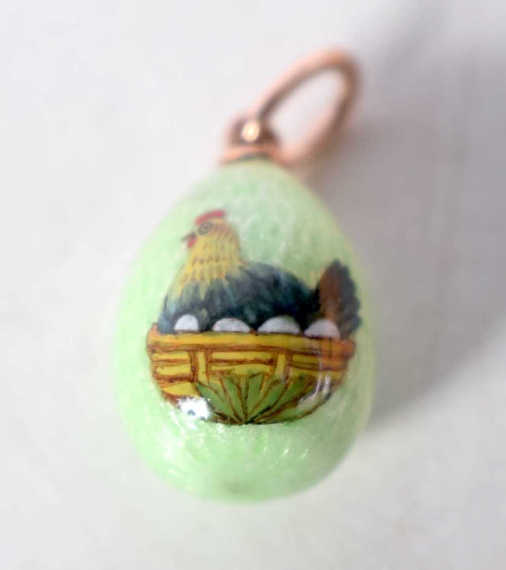 A Continental Enamel Egg Pendant with Gold Mounts. Stamped 56. 1.9cm x 1.2 cm, weight 2.9g - Image 3 of 3