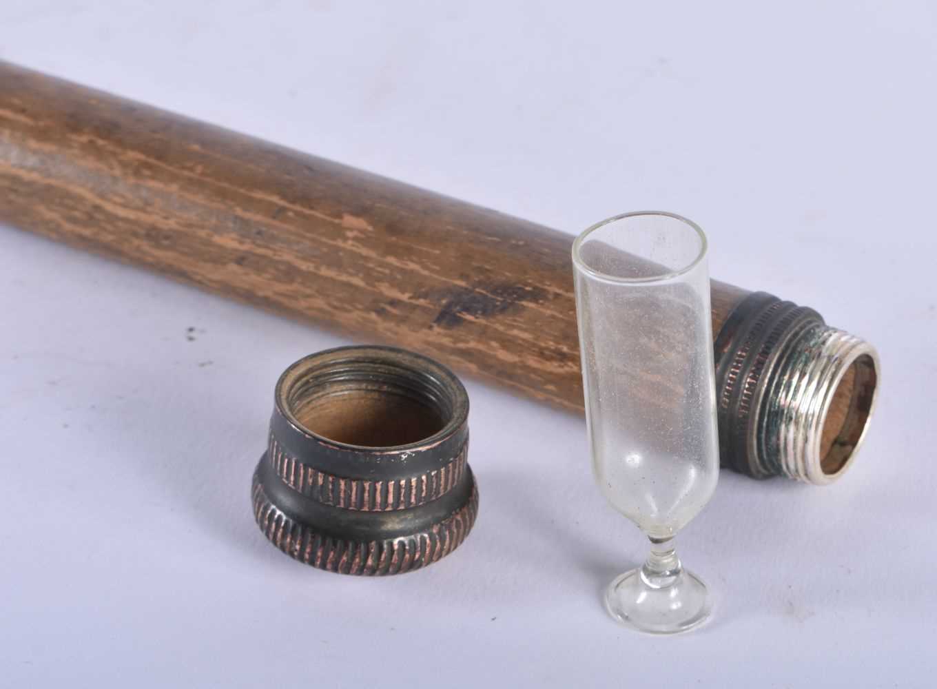 A RARE ANTIQUE COMBINATION WALKING CANE the top opening to reveal a tiny toasting glass, the central - Image 5 of 5