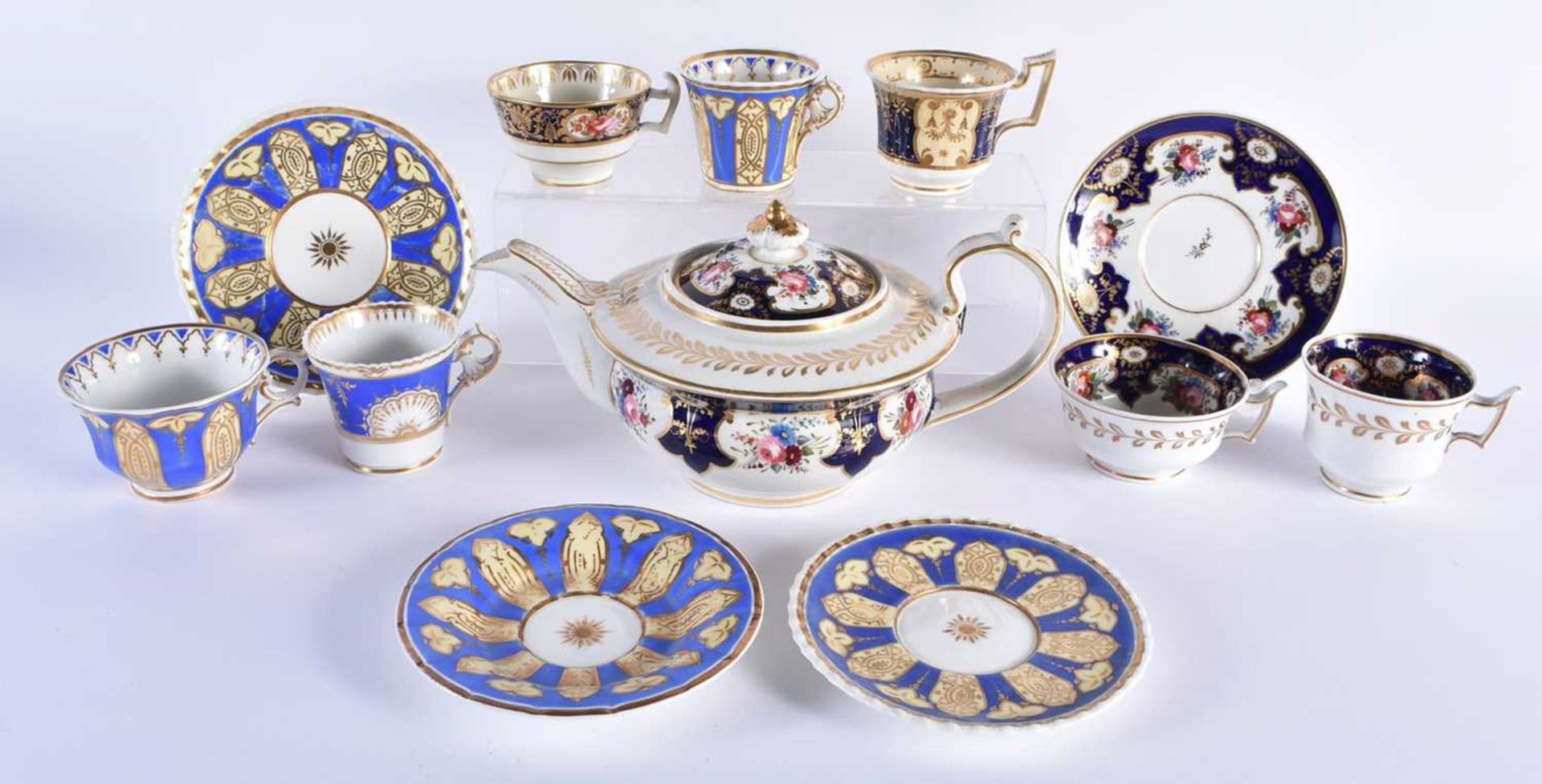 A COLLECTION OF EARLY 19TH CENTURY ENGLISH PORCELAIN TEAWARES in various forms and sizes. Largest 14