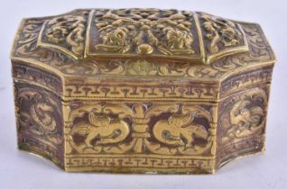 AN 18TH/19TH CENTURY TIBETAN INDIAN REPOUSSE CANTED BOX AND COVER decorated with birds, foliage