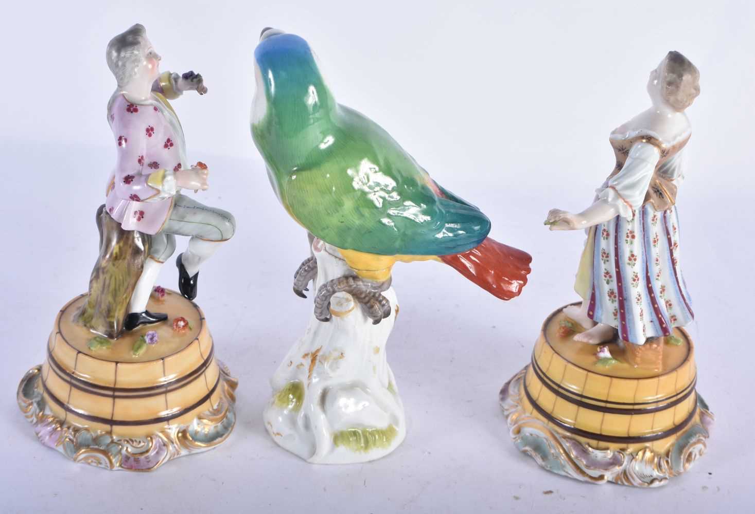 A MEISSEN PORCELAIN FIGURE OF A PARROT together with a pair of Continental figures. Largest 15 cm - Image 3 of 4