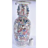 A LARGE 19TH CENTURY CHINESE FAMILLE ROSE PORCELAIN VASE Qing, painted with figures in interiors. 60