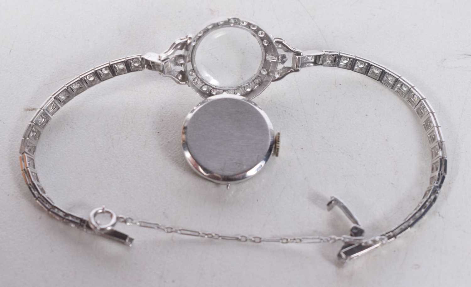 A Platinum Ladies Cocktail Watch set with diamonds. Stamped 10% IDID.PLAT. Length 13.5 cm, Dial 1. - Image 2 of 2