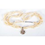 AN ANTIQUE DIAMOND SEED PEARL NECKLACE. 8.2 grams. 39 cm long.