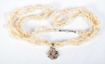 AN ANTIQUE DIAMOND SEED PEARL NECKLACE. 8.2 grams. 39 cm long.