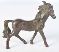 A Japanese Bronze Model of a Horse. 8 cm x 8.5 cm x 2.5 cm, weight 180g