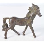 A Japanese Bronze Model of a Horse. 8 cm x 8.5 cm x 2.5 cm, weight 180g