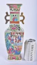 A LARGE 19TH CENTURY CHINESE CANTON FAMILLE ROSE TWIN HANDLED VASE Qing. 30cm high.