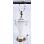 A LARGE CONTINENTAL TWIN HANDLED WHITE PORCELAIN VASE LAMP. 68 cm high.