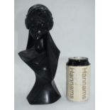 A polished stone bust of Scheherazade signed E Villanis 26cm.