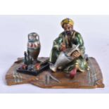 AN AUSTRIAN COLD PAINTED BRONZE FIGURE OF A TURKISH TRADESMAN. 10 cm x 8 cm.