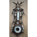 An early 20th Century wooden and antler horn Barometer and thermometer 69 cm.