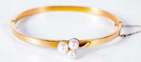 An Antique 15 Carat Gold Bangle set with 3 Pearls. Stamped 15CT, 4.8 cm x 5.7cm, weight 6.6g