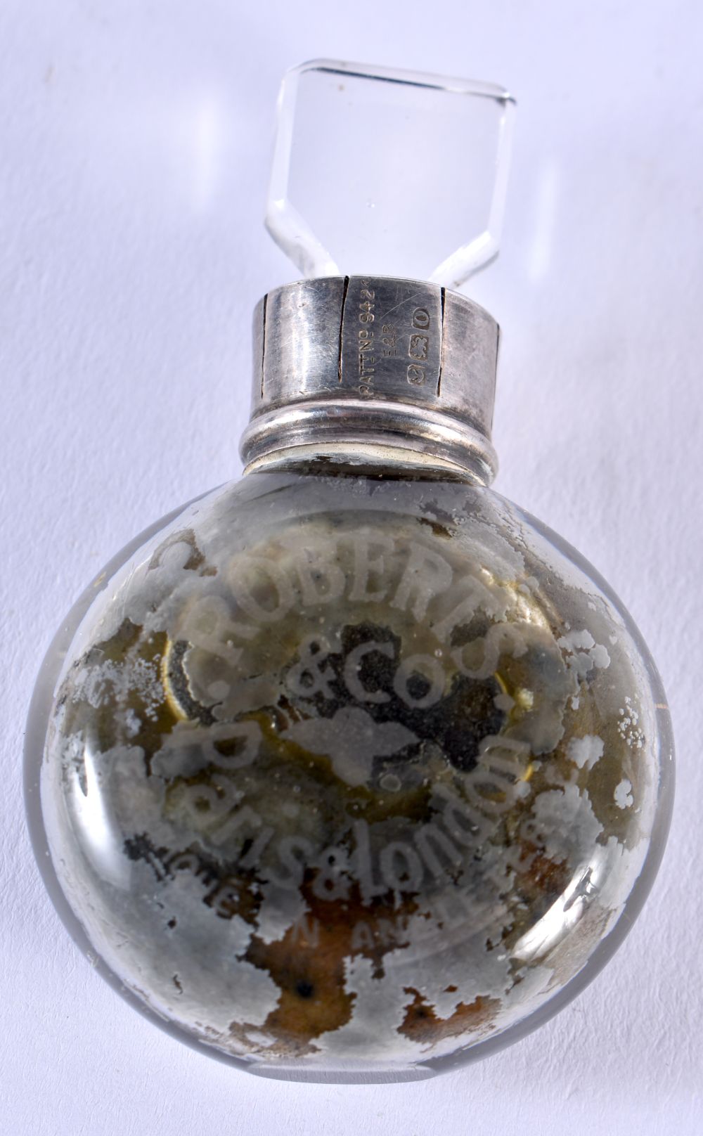 An Edwardian Silver Top Scent Bottle for Roberts & Co of Paris and London in a Leather Case.