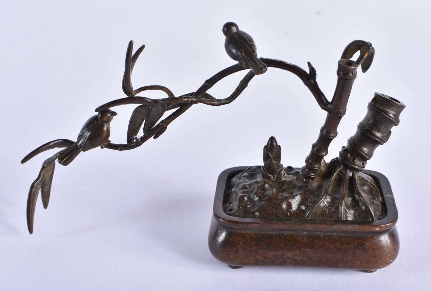 A JAPANESE BRONZE BIRD ON STUMP OKIMONO. 381 grams. 12.5 cm x 3.75 cm.