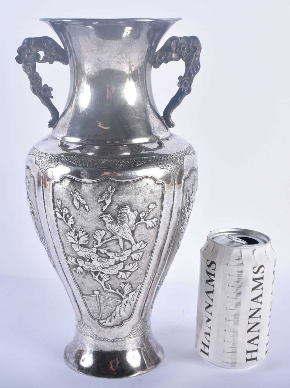 A LARGE LATE 19TH CENTURY CHINESE EXPORT TWIN HANDLED VASE probably silver. 730 grams. 30cm high.