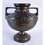 An Arts and Crafts Celtic Style Bronze 2 Handled Urn. 46cm x 41cm