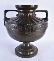 An Arts and Crafts Celtic Style Bronze 2 Handled Urn. 46cm x 41cm