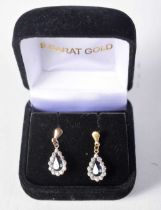 A Cased Pair of Sapphire and Diamond Earrings. 2.1cm x 0.8 cm, weight 0.8g