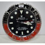 A Contemporary Rolex style dealership clock 33 cm.