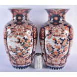 A LARGE PAIR OF 19TH CENTURY JAPANESE MEIJI PERIOD COUNTRY HOUSE IMARI VASES painted with foliage