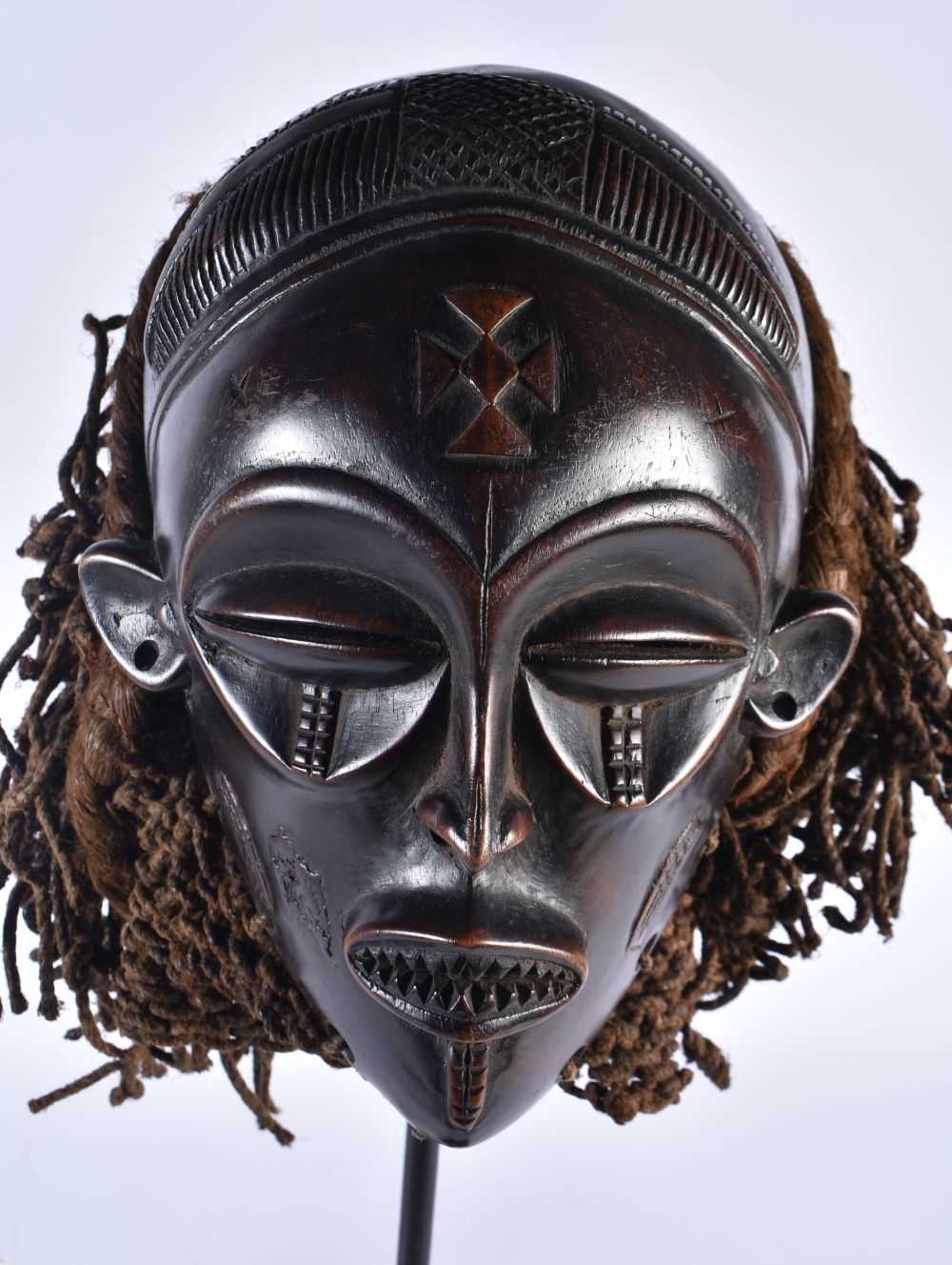 A LARGE EARLY 20TH CENTURY AFRICAN TRIBAL WOOD MASK with later stand. 58 cm x 14 cm. - Image 2 of 8