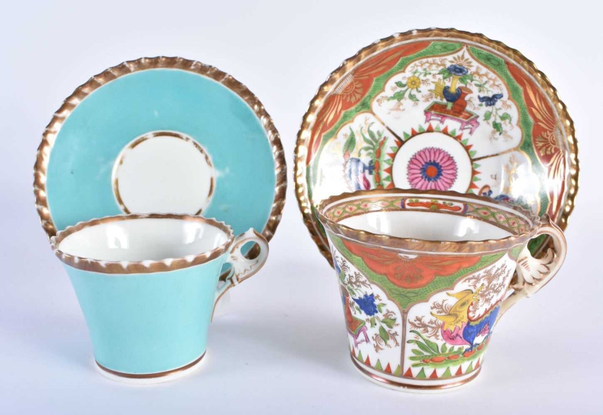 TWO EARLY 19TH CENTURY CHAMBERLAINS WORCESTER CUPS AND SAUCERS one painted with turquoise, the other