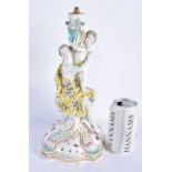 A LARGE 19TH CENTURY GERMAN MEISSEN PORCELAIN FIGURAL CANDLESTICK formed with a female and child. 31