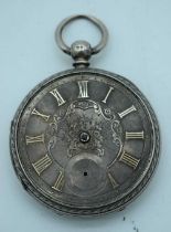 A VICTORIAN SILVER POCKET WATCH. London 1877. 120.4 grams. 5.5 cm diameter.