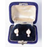 A Cased Pair of Diamond and Pearl Earrings. 1.1cm x 0.7cm, weight 2.1g
