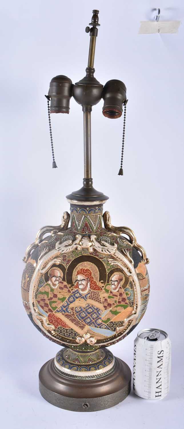 A LATE 19TH CENTURY JAPANESE MEIJI PERIOD SATSUMA LAMP painted with scholars. 60 cm high.